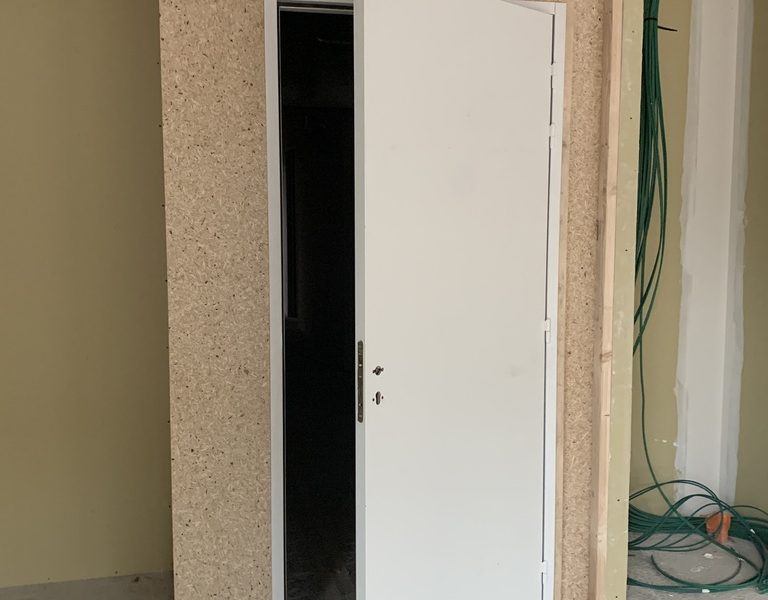 Bloc porte CF1/2H âme pleine stratifiée